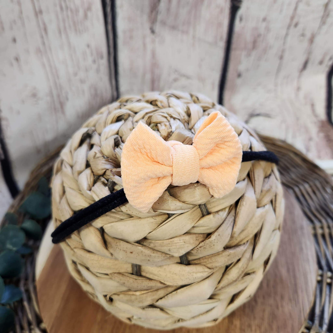 Apricot Itty Bitty Bow on Black Nylon